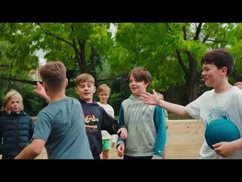 Kids playing Gaga Ball in a timber Outdoor Gaga Ball Pit by Gaga Games Australia