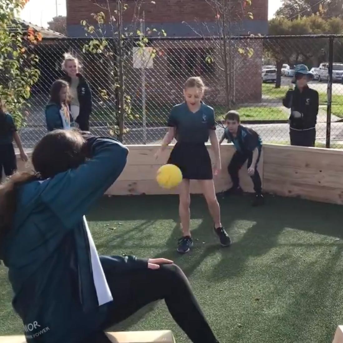 High School Kids playing in a Timber Gaga Ball Pit